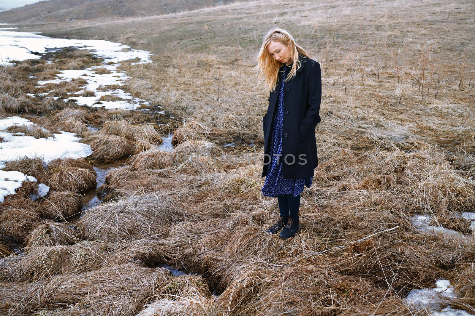 Woman standing at the swamp