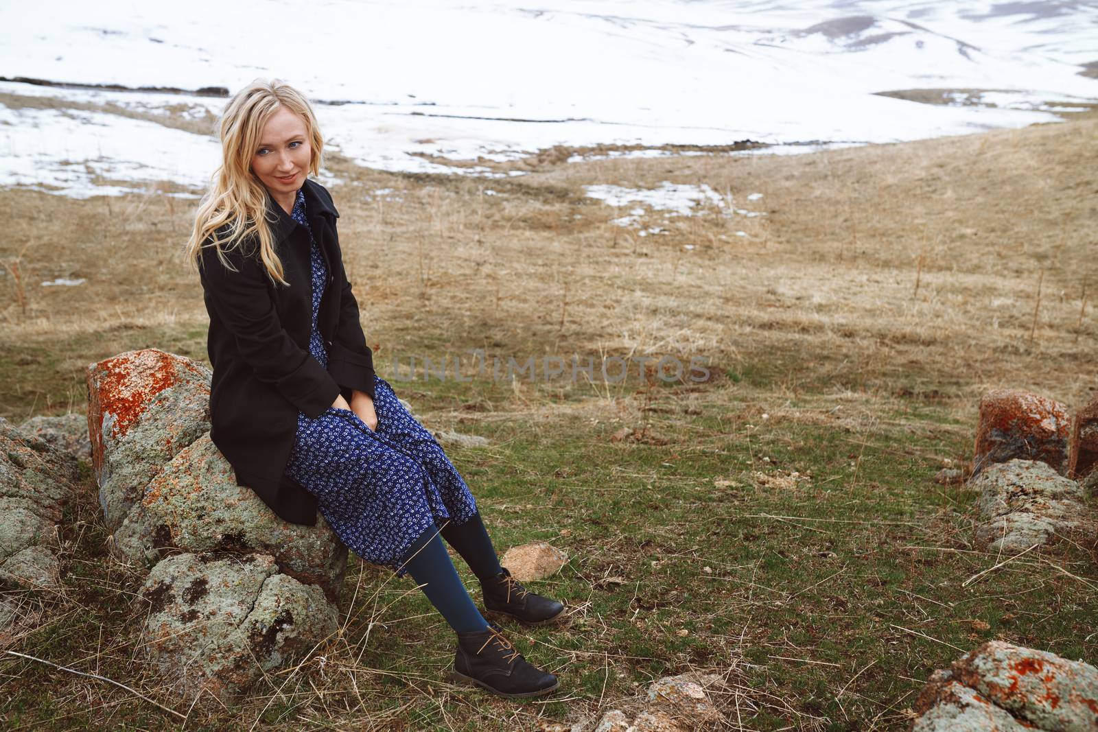 Smiling woman in the winter landscape