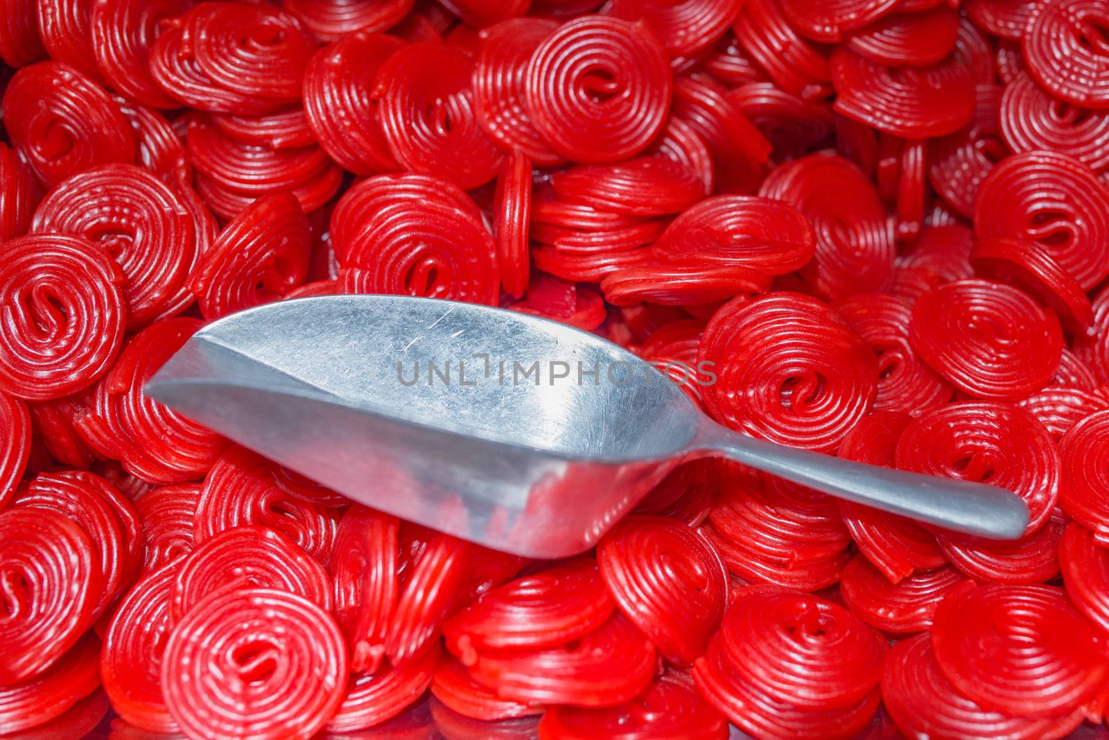 Red Twisted Spiral Jelly with big metal spoon. by petrsvoboda91