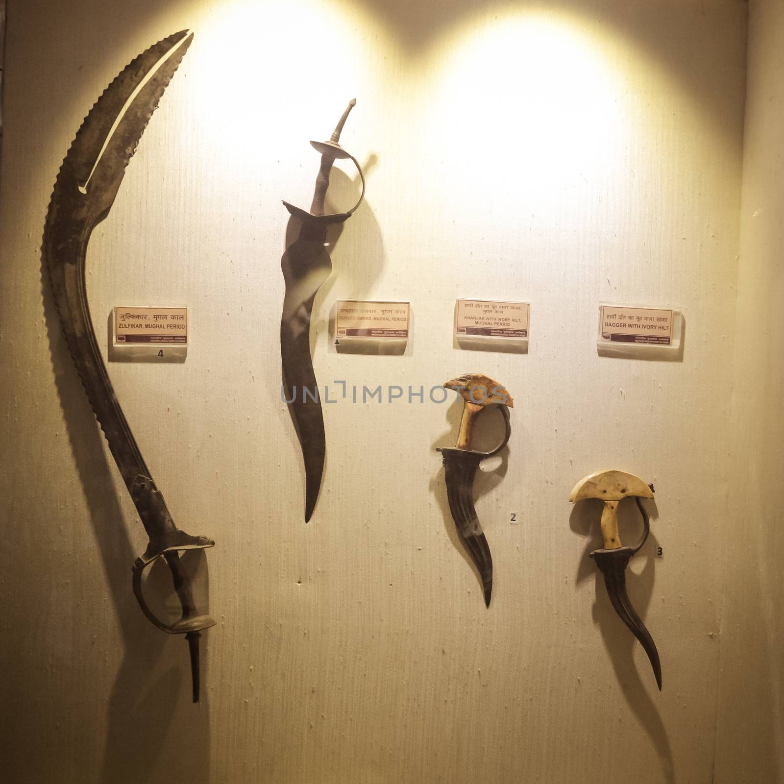 Red Fort Museum of Arms and Weapons, New Delhi, Jul 21, 2018: Arms and Weapons Showcased here in Galleries includes Arrows, Swords, Revolvers, Machine Guns, Shells, Daggers Ivory and Battle Axes. by sudiptabhowmick