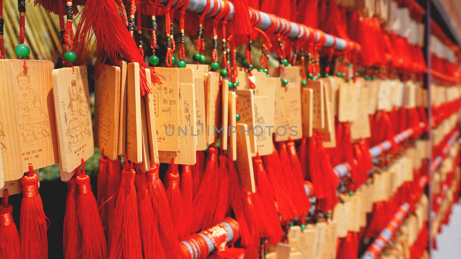 eople write and hang Ema Wood tag or Wooden label for praying for good luck happy other at Sanya, China