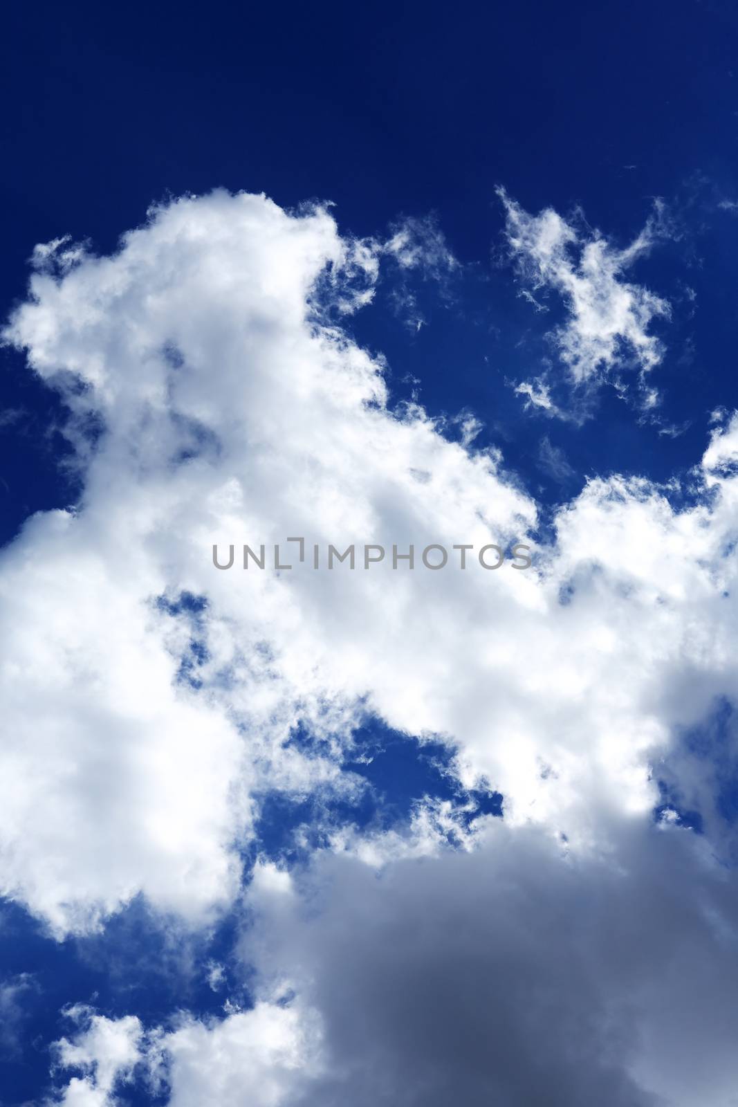 Nice natural background with white clouds against blue sky