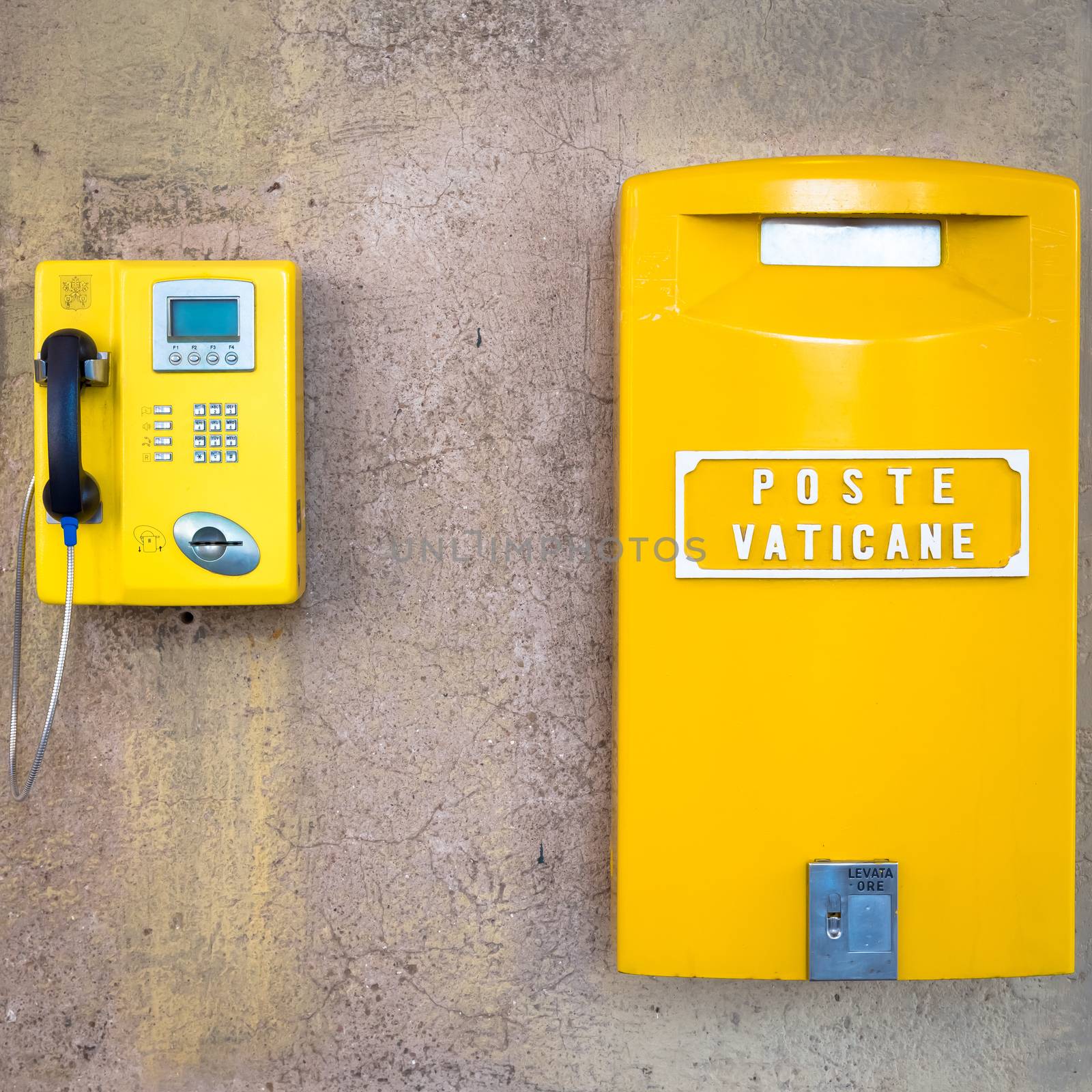 ROME, VATICAN STATE - AUGUST 19, 2018: Detail of the traditional yellow post box in Vatican City, Rome