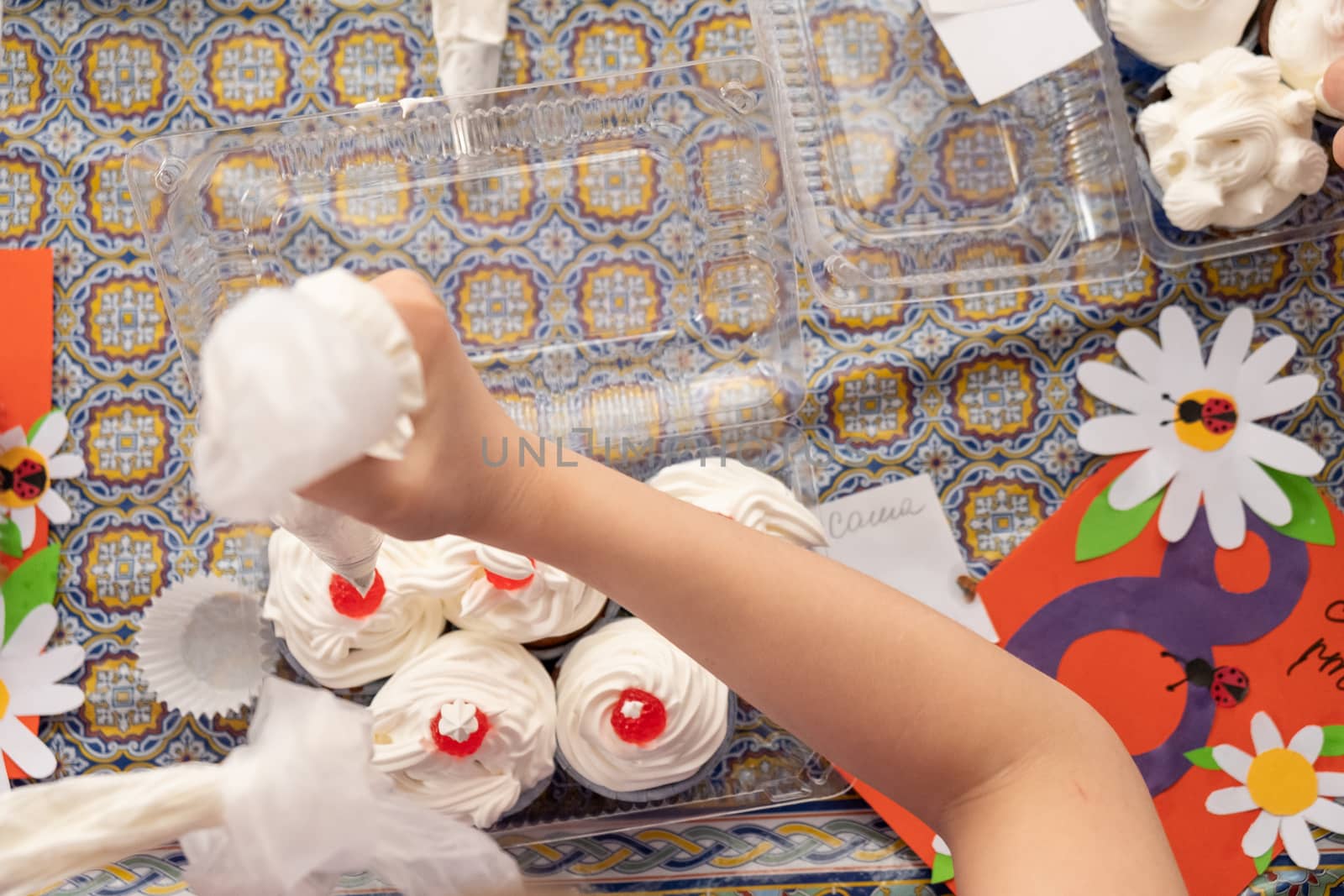 Khabarovsk, Russia - March 02, 2019: cooking master class on making cupcakes with cream. by rdv27