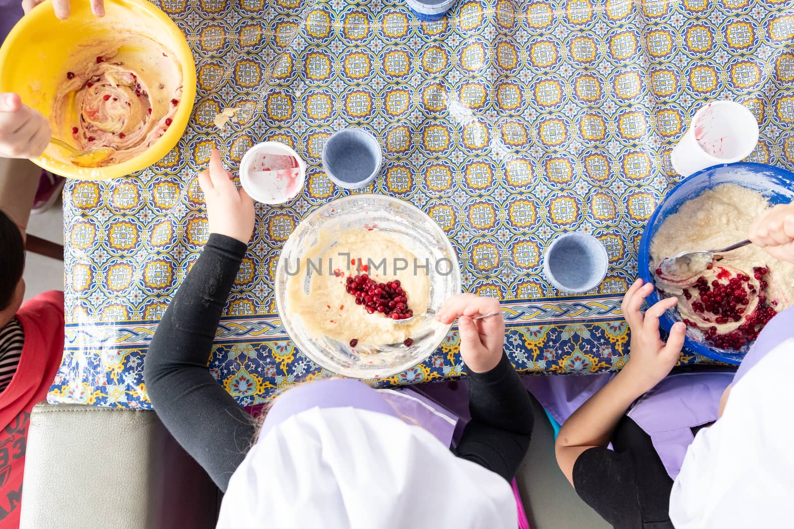 Khabarovsk, Russia - March 02, 2019: cooking master class on making cupcakes with cream. by rdv27