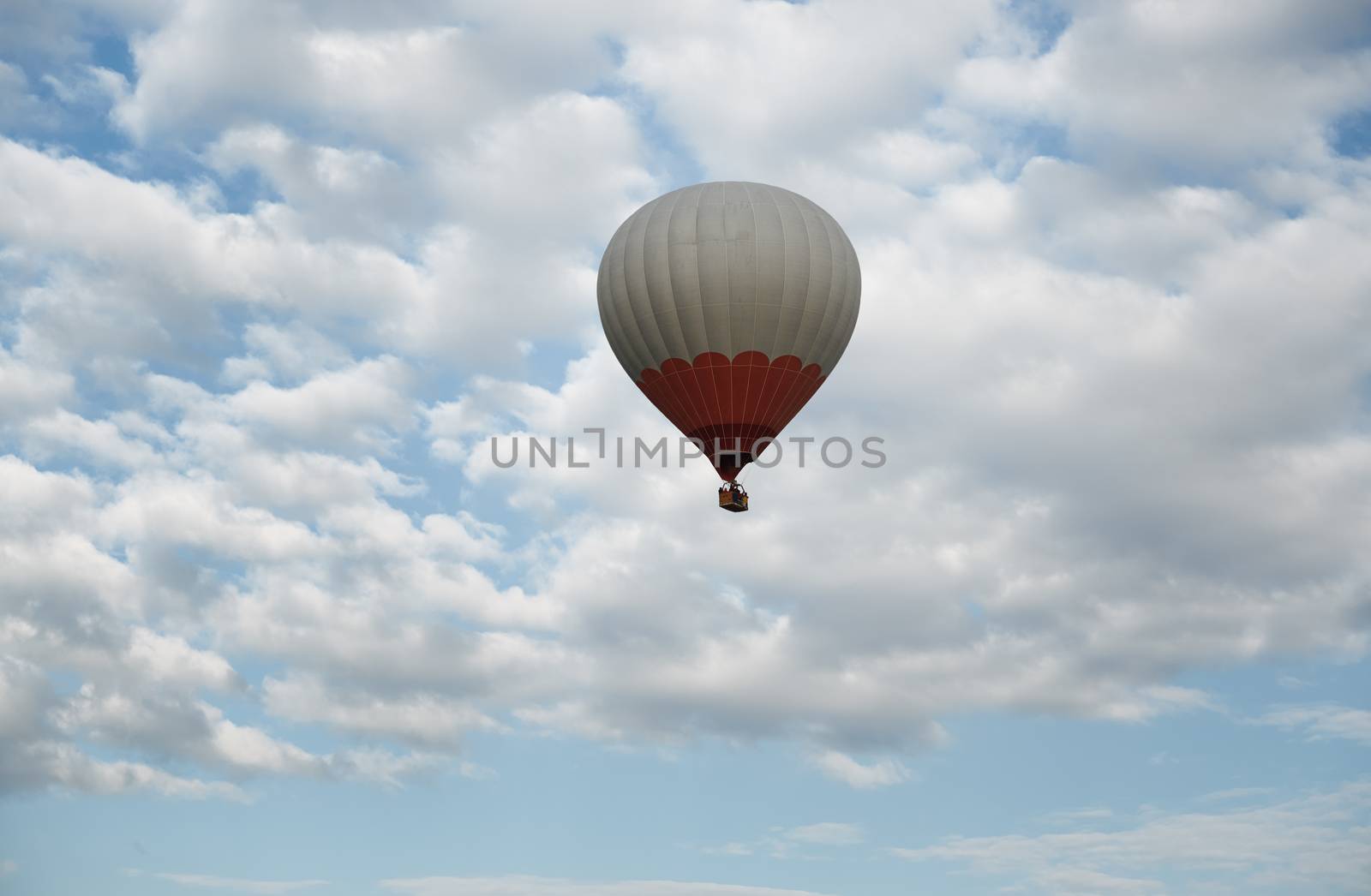 One hot air balloon flying in the sky by Novic