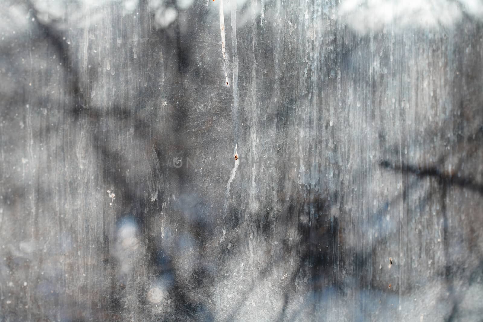 Textured background of the dirty window glass by Novic