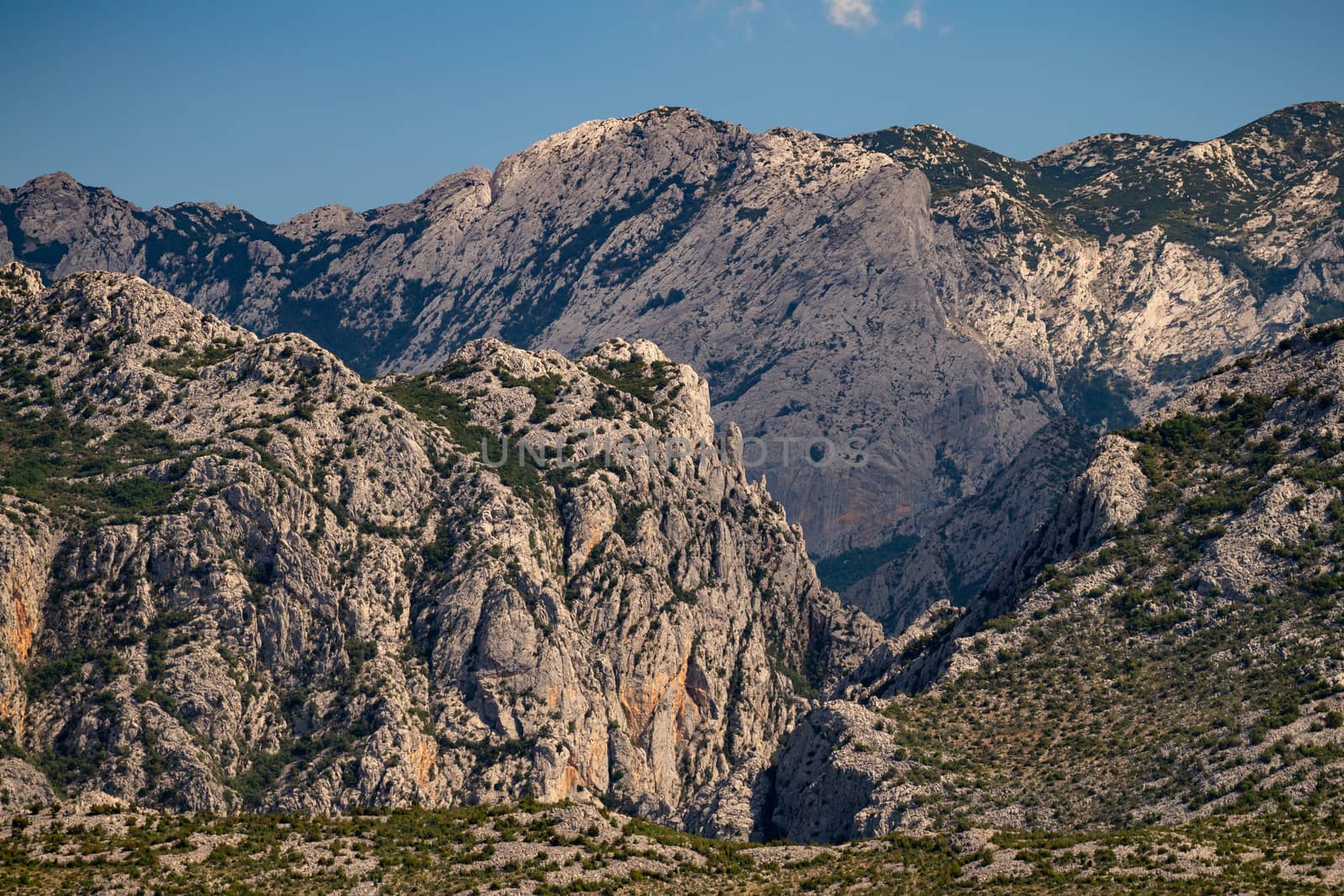 Extreme mountains in Paklenica National Park, Velebit, are popular place for hiking and climbing tourism in Croatia. Paklenica offers scenic landscapes in pristine environment. Desserted landscape concept, copyspace