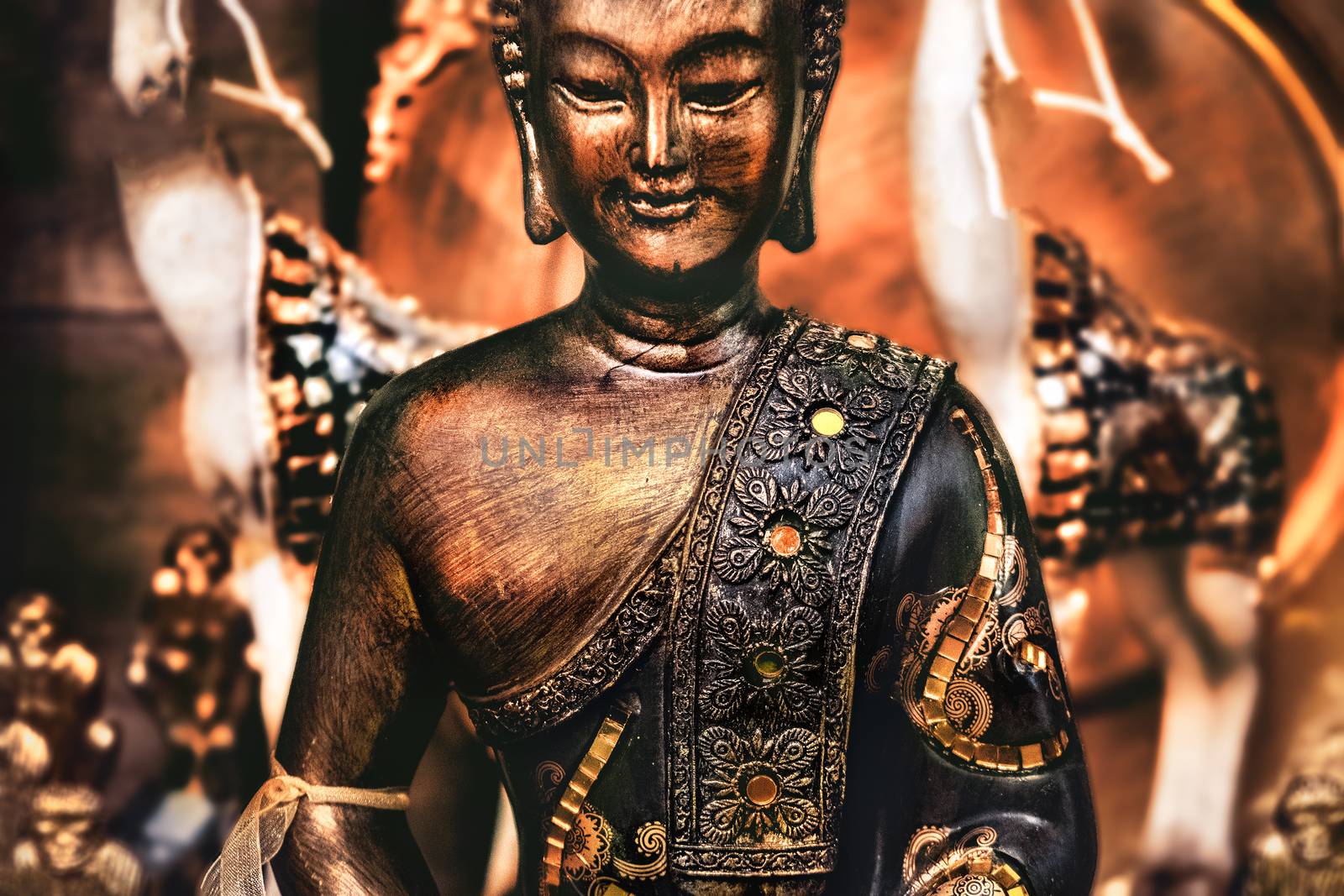 buddha meditating yoga background bronze orange statue .