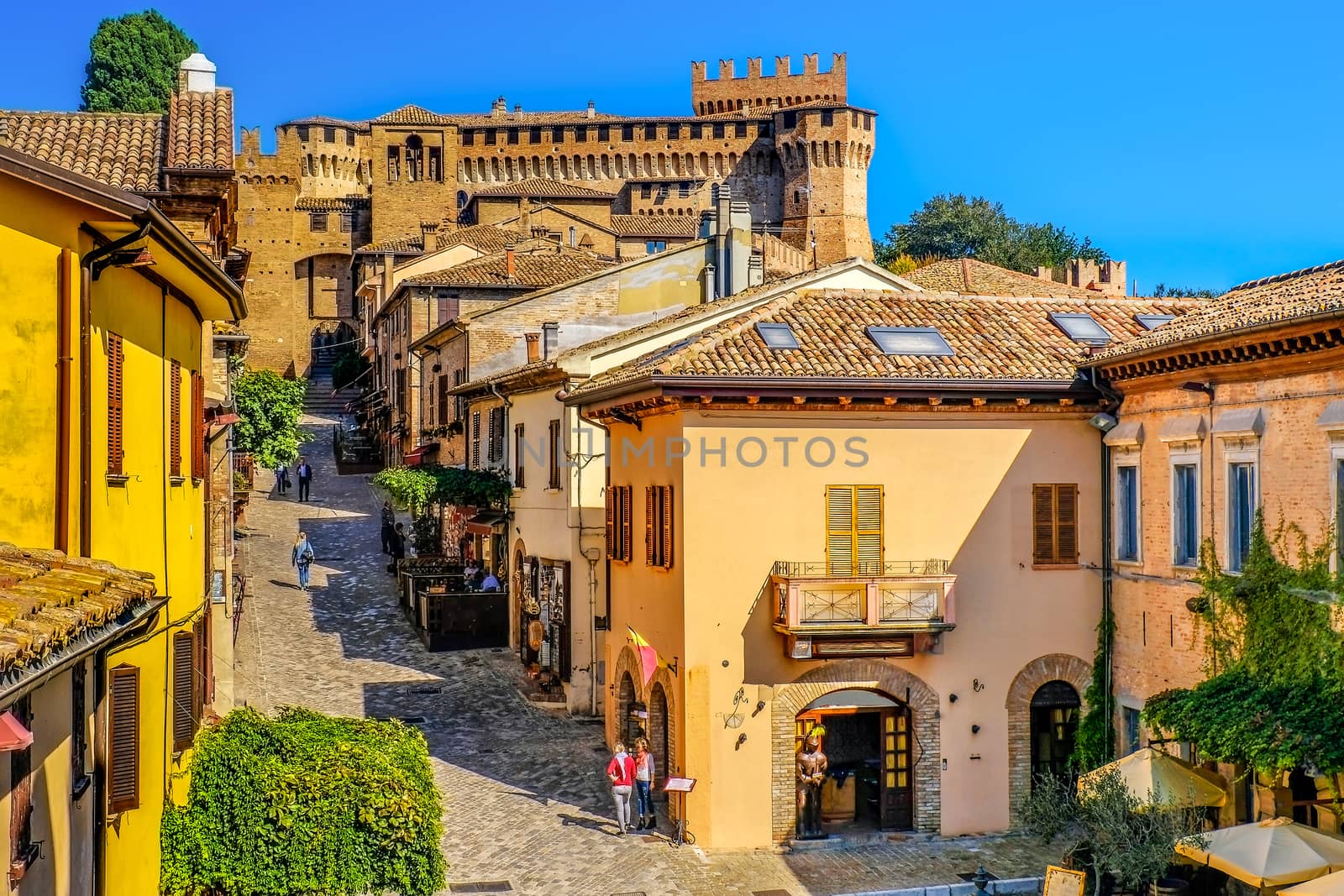 mediaeval town buildings of Gradara italy colorful houses village streets by LucaLorenzelli