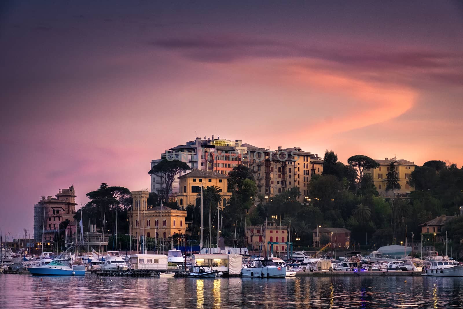 North Italy sea village sunset vignette purple sky - Rapallo - Genoa - Italian Riviera .