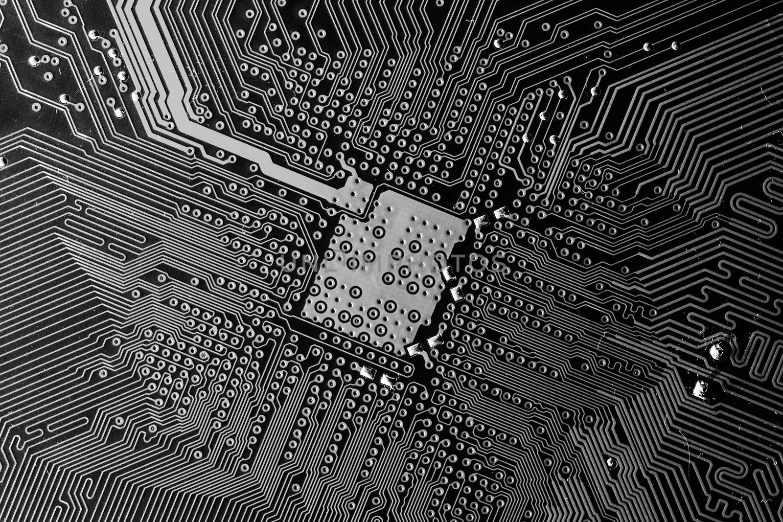 Close up photo of black and white pcb printecd circuit board electric paths by petrsvoboda91