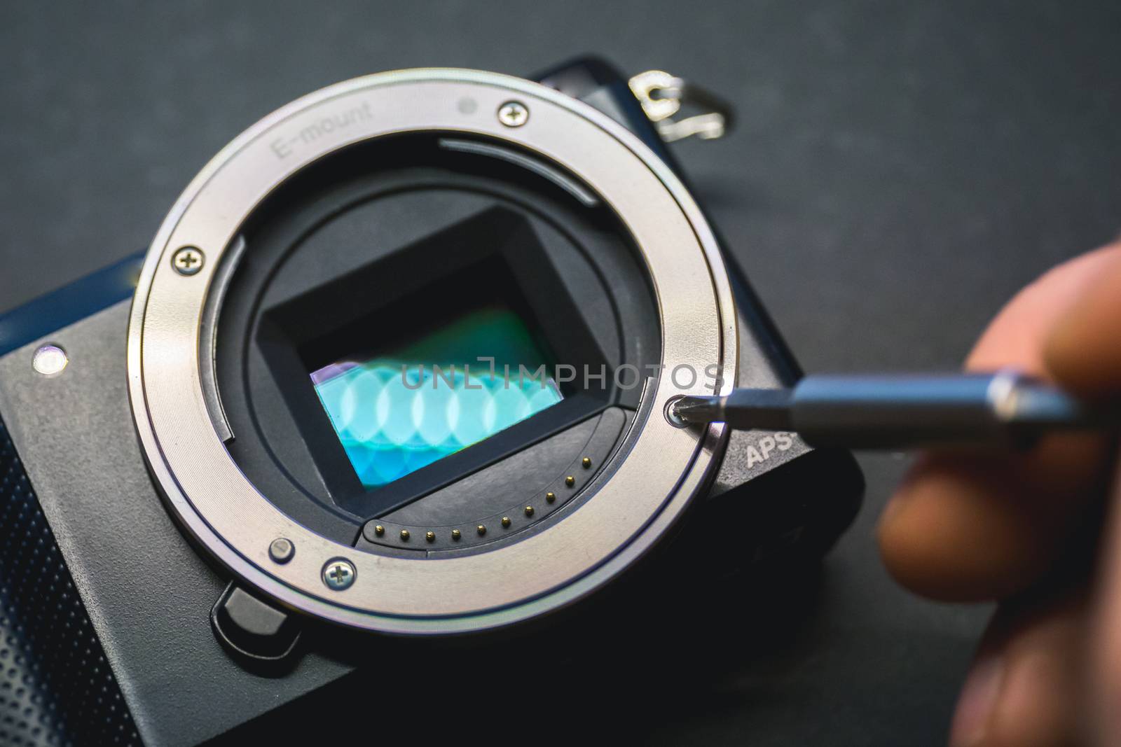 Mirrorless camera sensor repair, screwdriwer over lens mount. by petrsvoboda91
