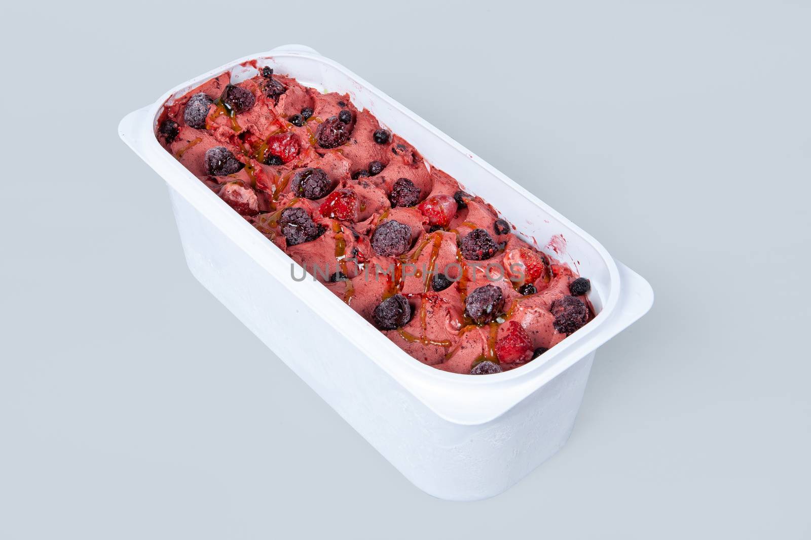 Icecream with different ingredients on a studio neutral background