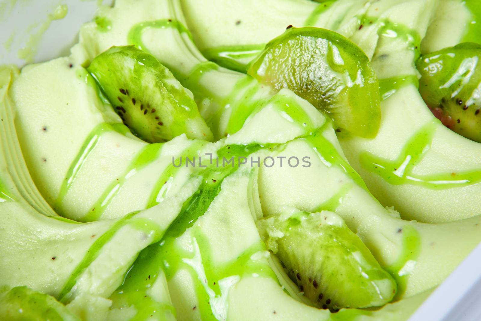 Icecream with different ingredients on a studio neutral background