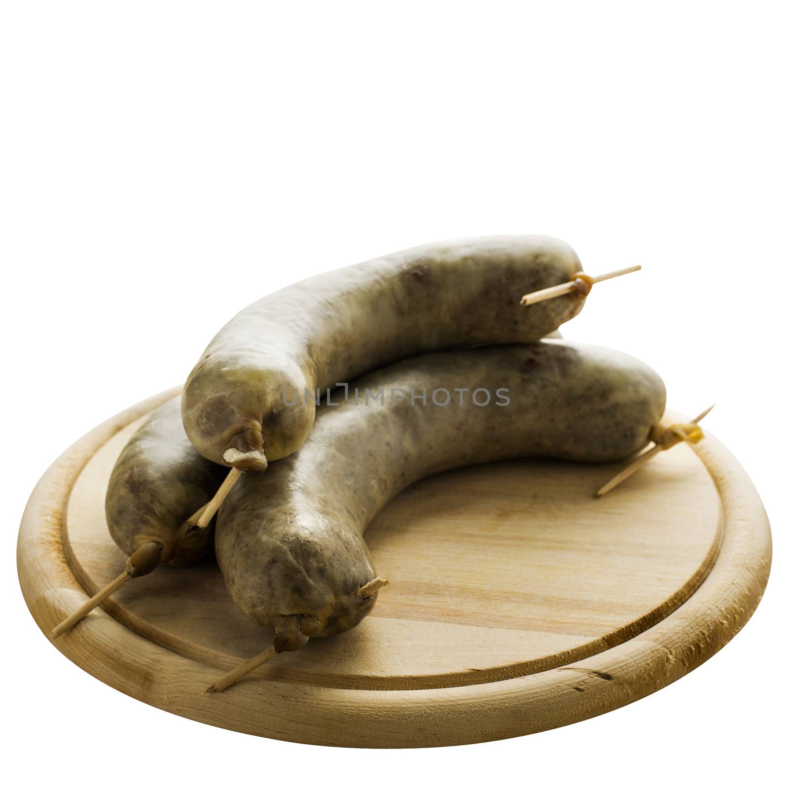 Tripe sausages served on a wooden board, isolated