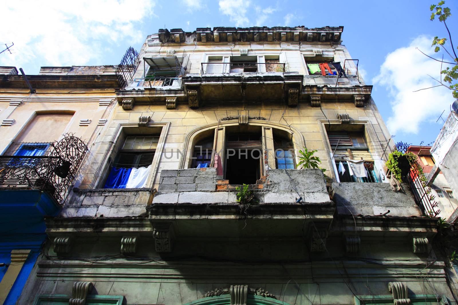 Hanging laundry to dry on balcony in Havana, Cuba