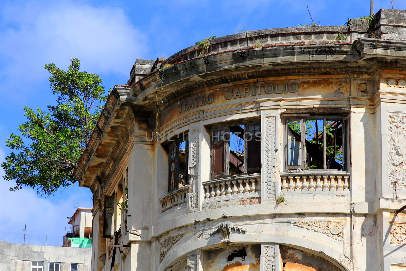 Deteriorated building Teatro Capitolio in Old Havana by friday