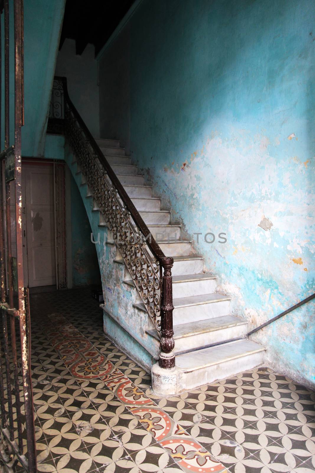 Staircase in a house in Old Havana, Cuba by friday