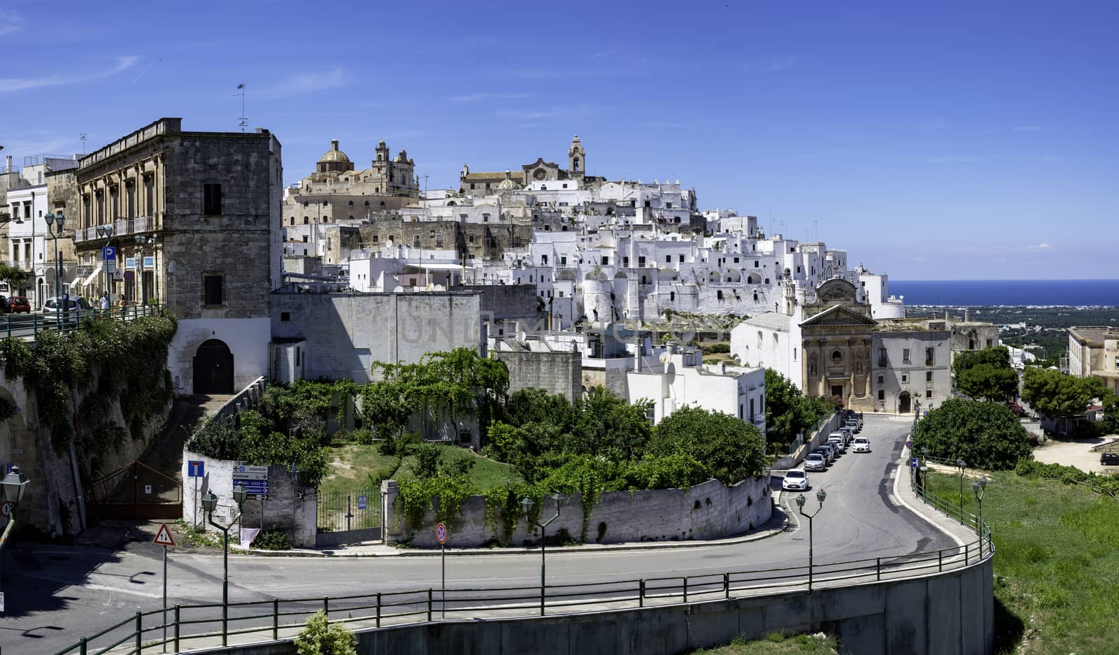 Scenic view of white village of Ostuni (Brindisi). Puglia. Italy Ostuni white town skyline at sunset, Brindisi, Apulia southern Italy. Europe.