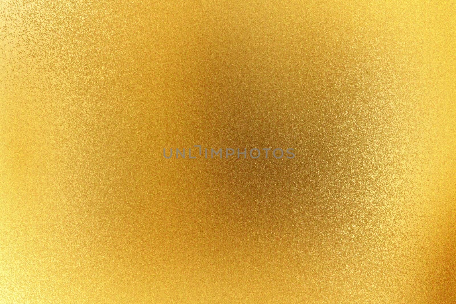 Shiny rough gold metallic panel, abstract texture background
