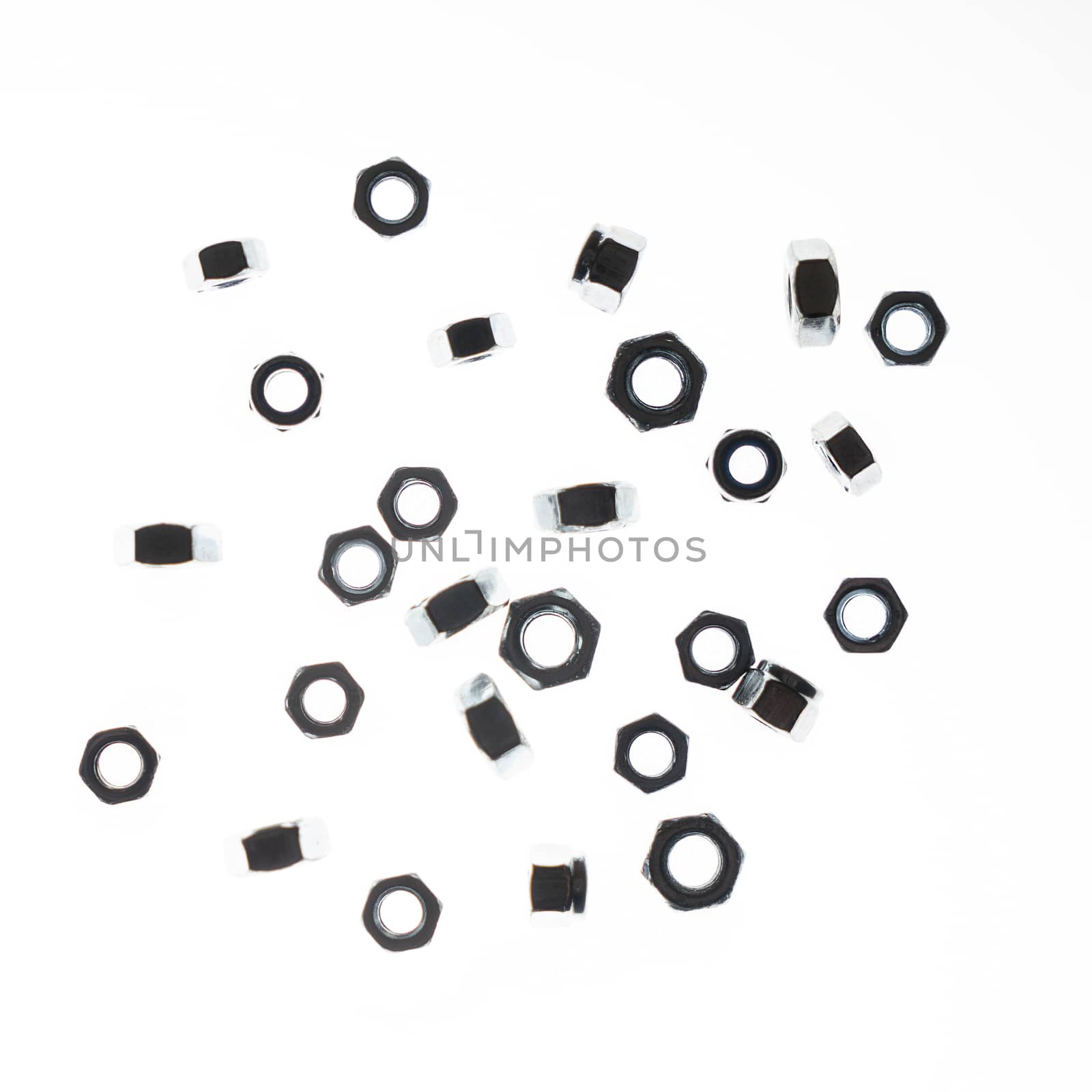 some lock nuts of various sizes on a white background