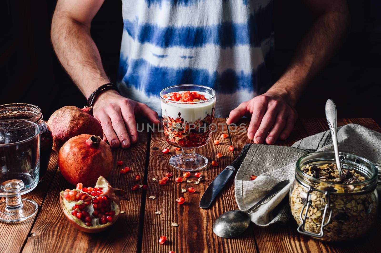 Cooked Dessert with Ingredients. Series on Prepare Healthy Dessert with Pomegranate, Granola, Cream and Jam