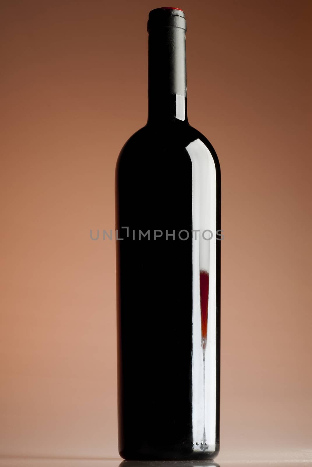 Bottle of wine, reflection of a glass of wine, red wine by jalonsohu@gmail.com