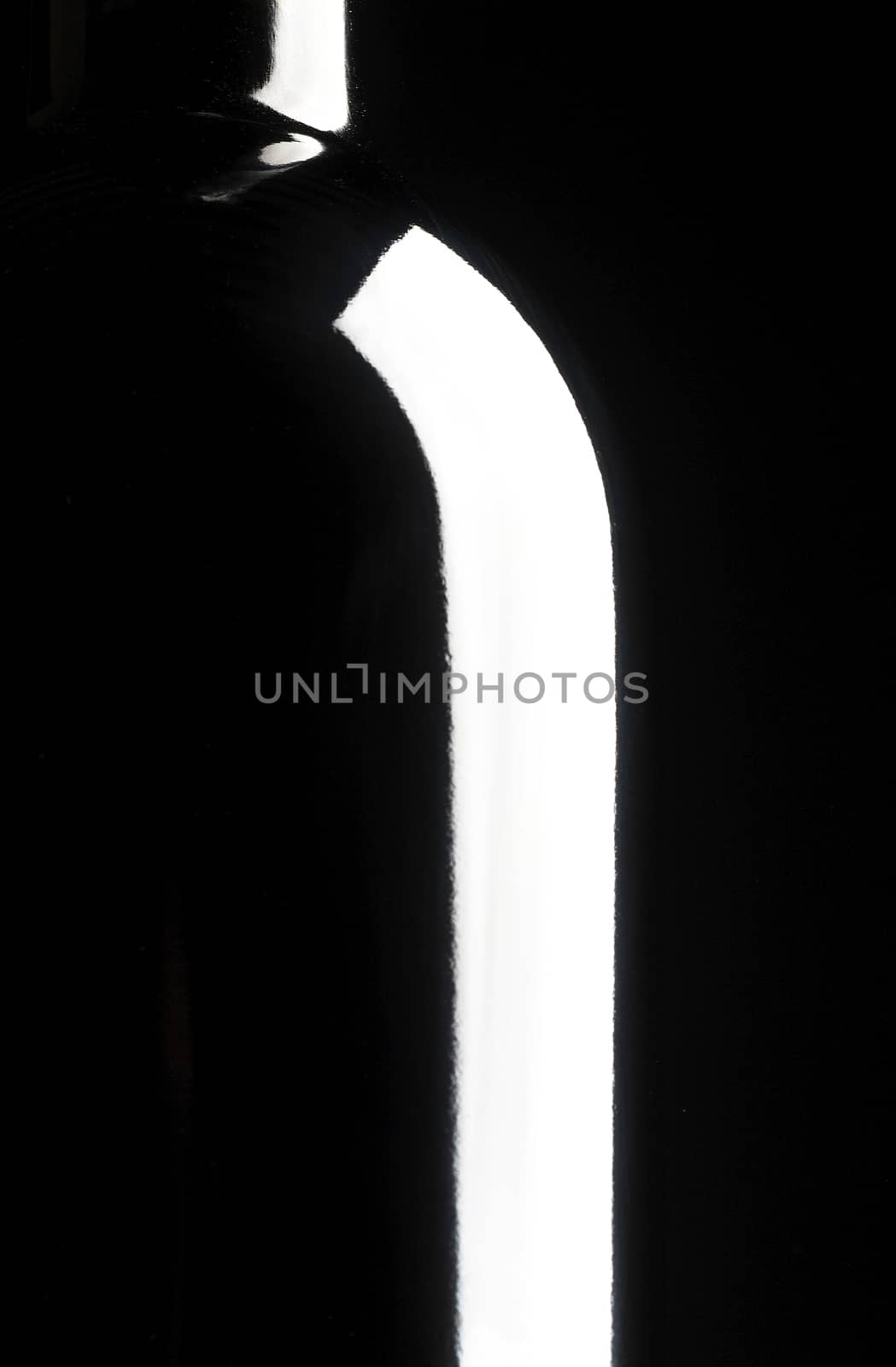 Silhouette of wine bottle, black background