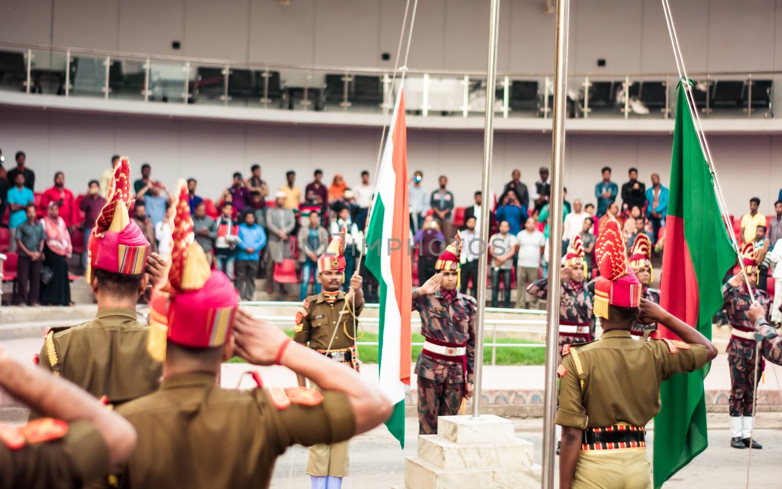 Petrapole-Benapole, Bangaon, 5th Jan, 2019: Joint Retreat of lowering of national flags Ceremony, a military show as Wagah Border with soldiers of Border Guard Security Force of India and Bangladesh. by sudiptabhowmick