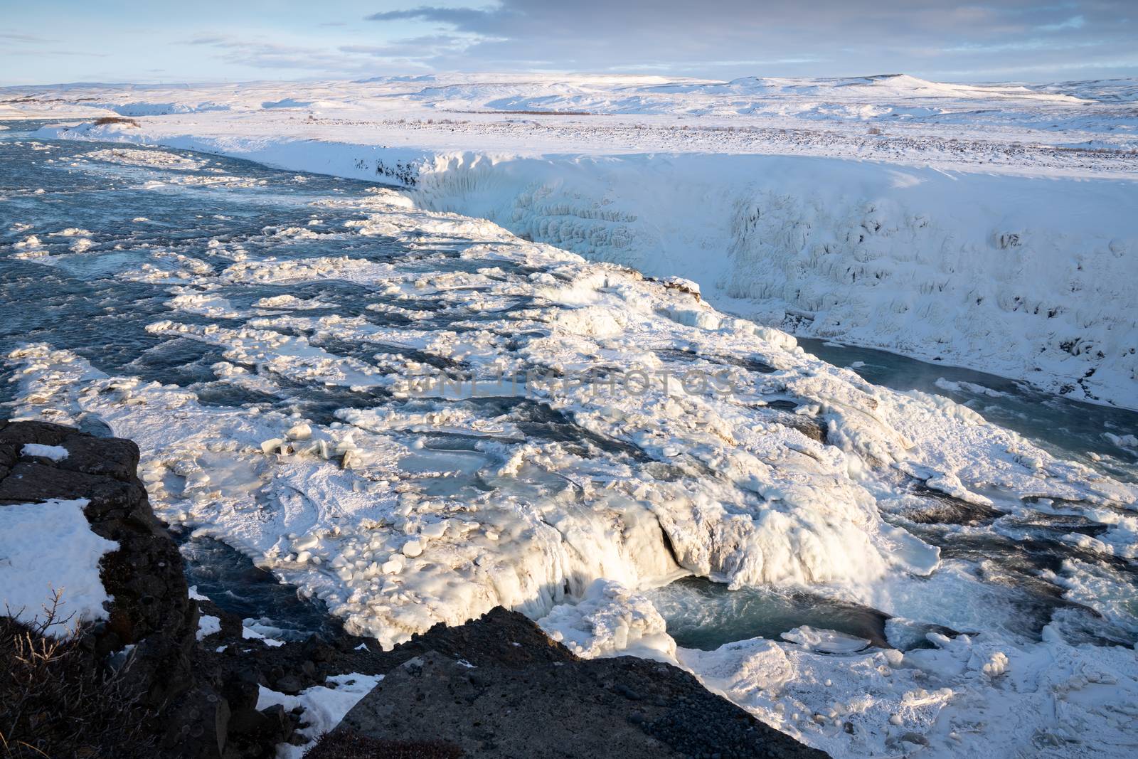 Panoramic image of the frozen waterfall Gullfoss, Iceland, Europe