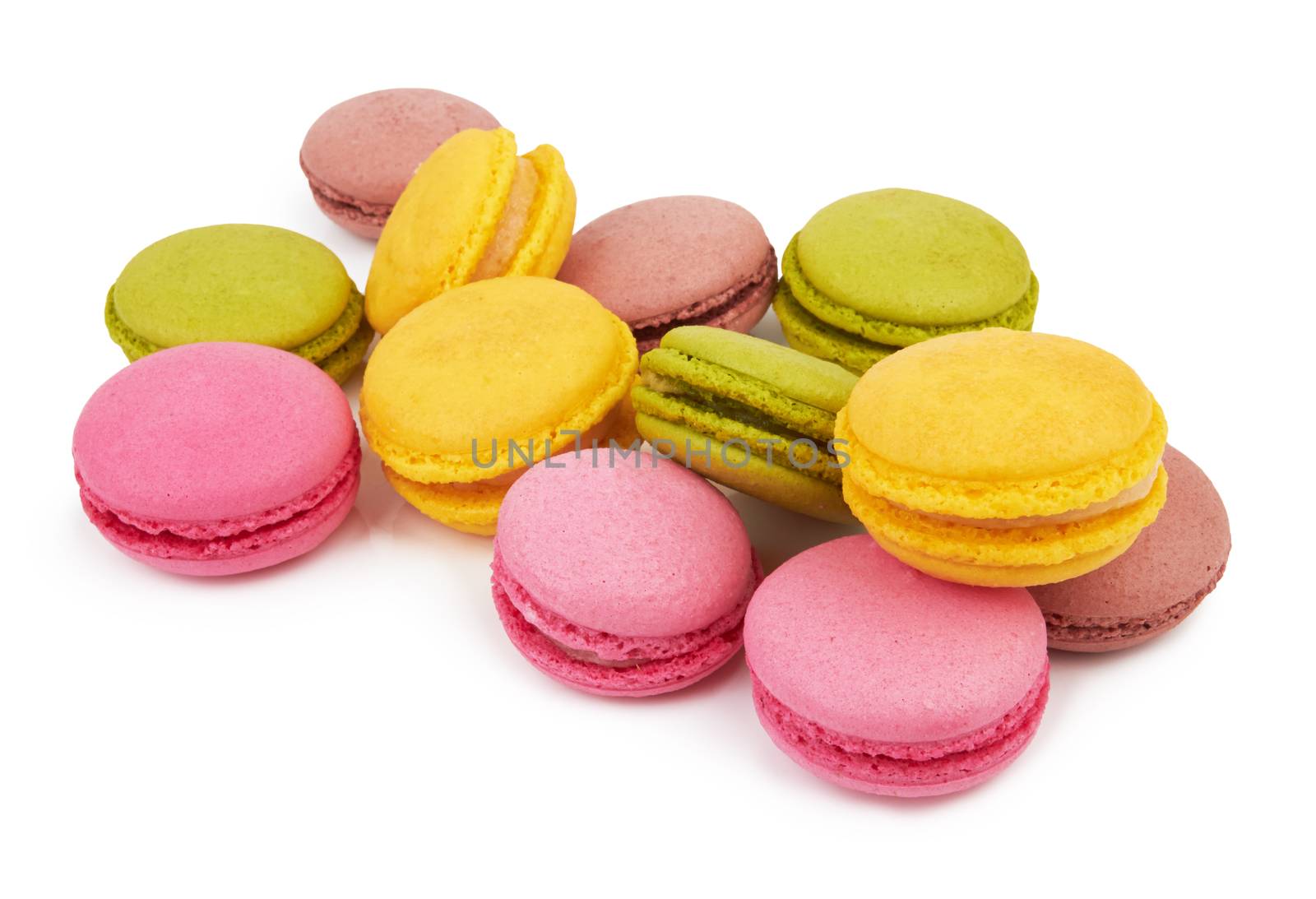 french colorful macarons isolated on white background