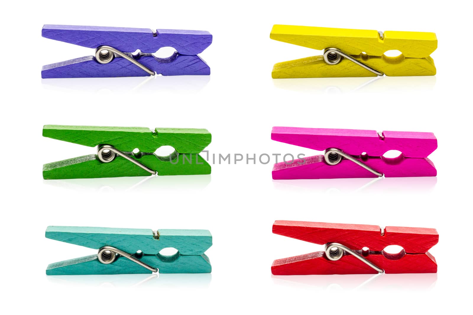 Colorful clothespin. Multicolor Wooden clip set on white backgro by SaitanSainam