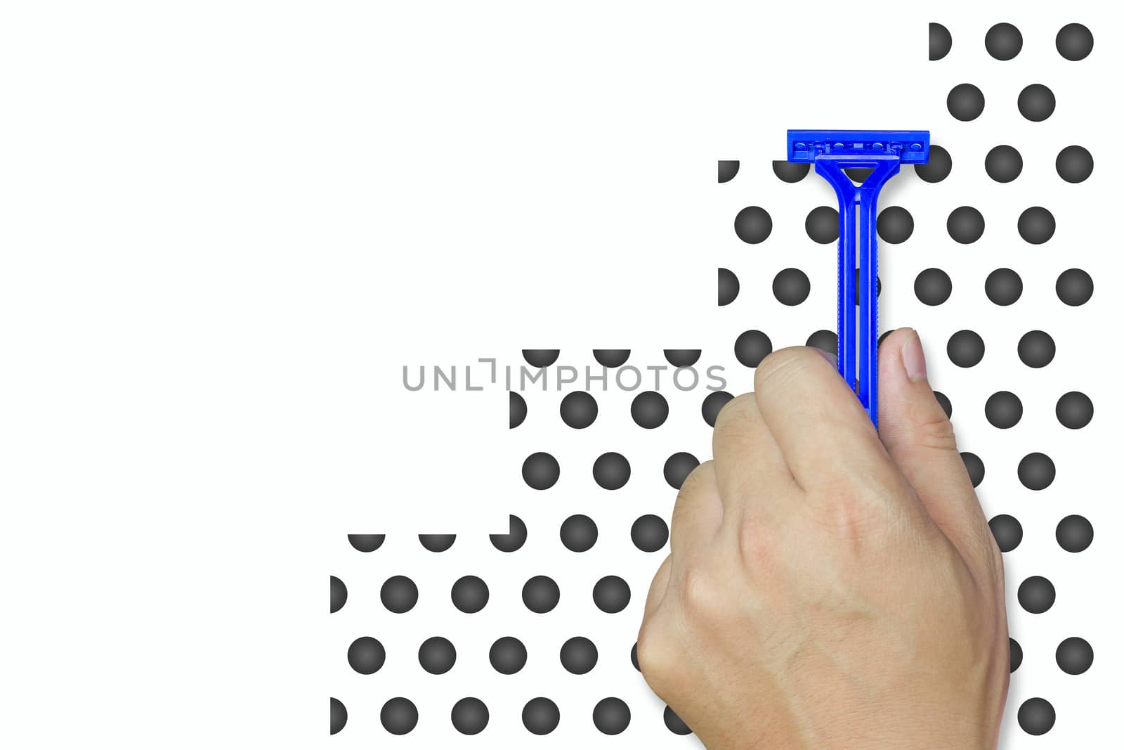 Hand holding Razor blue on beard simulator. Concept of sharpness can shave things smoothly.