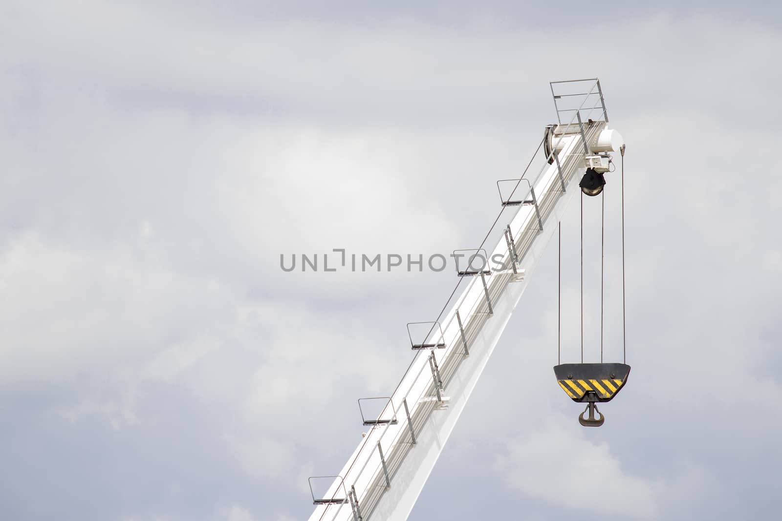 White lifting crane with black lifting hoop