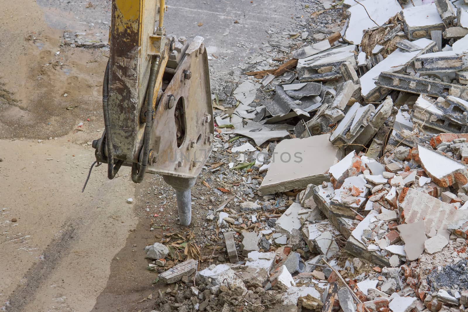 Demolition of an industrial building and drill concrete machine 