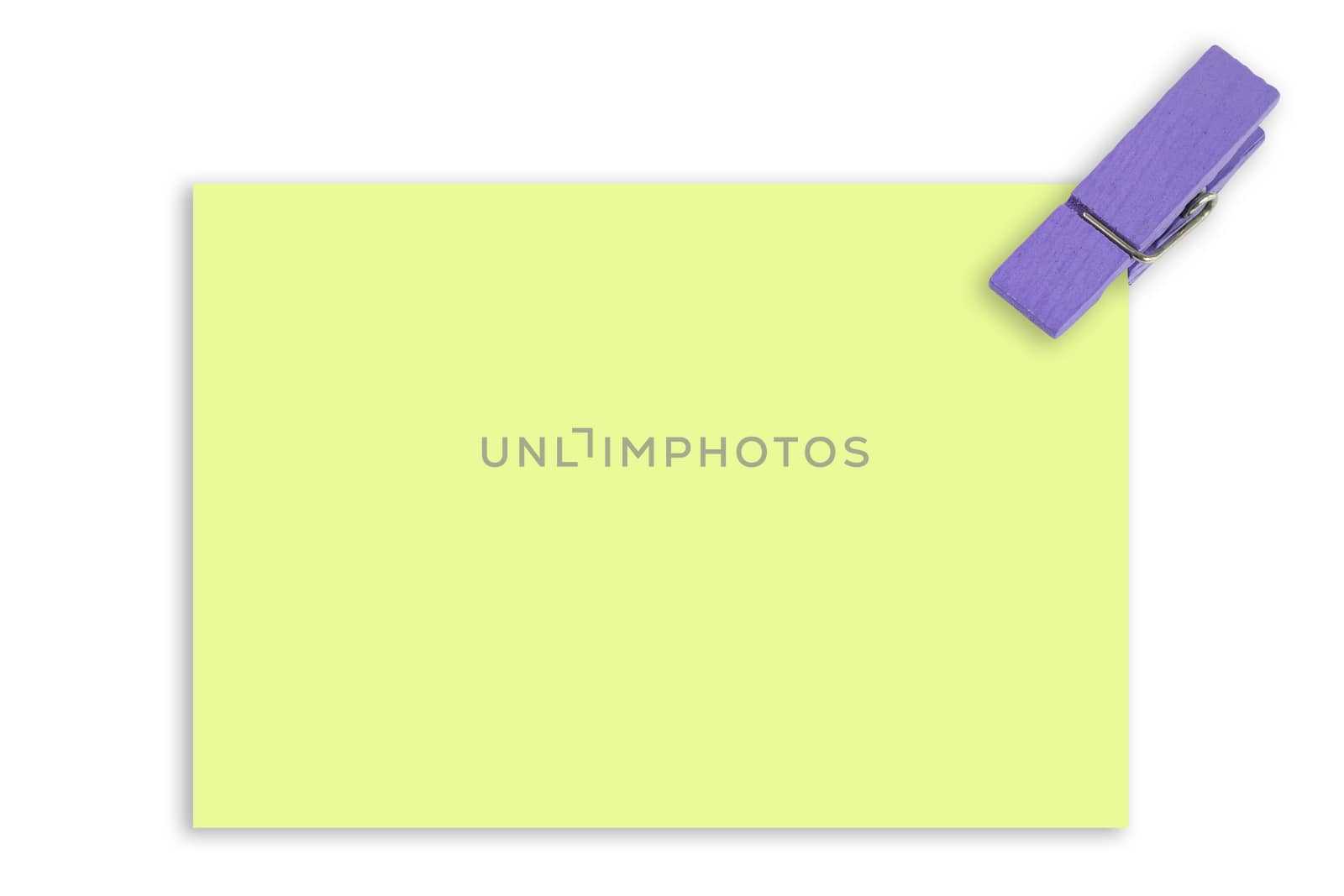 Blue wooden clip clamp yellow note on a white background. With clipping path.