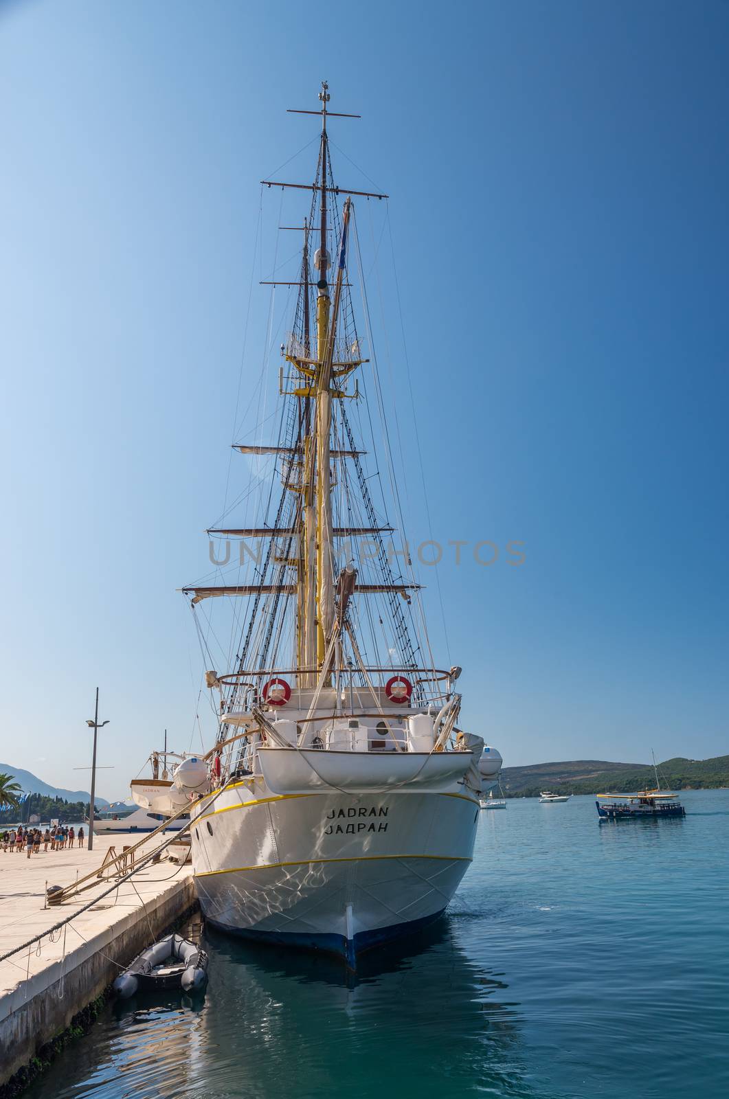 Tivat, Montenegro - 07.11.2018. Cruise ship in sea port, Embankment of Tivat city, Montenegro, in a sunny summer day