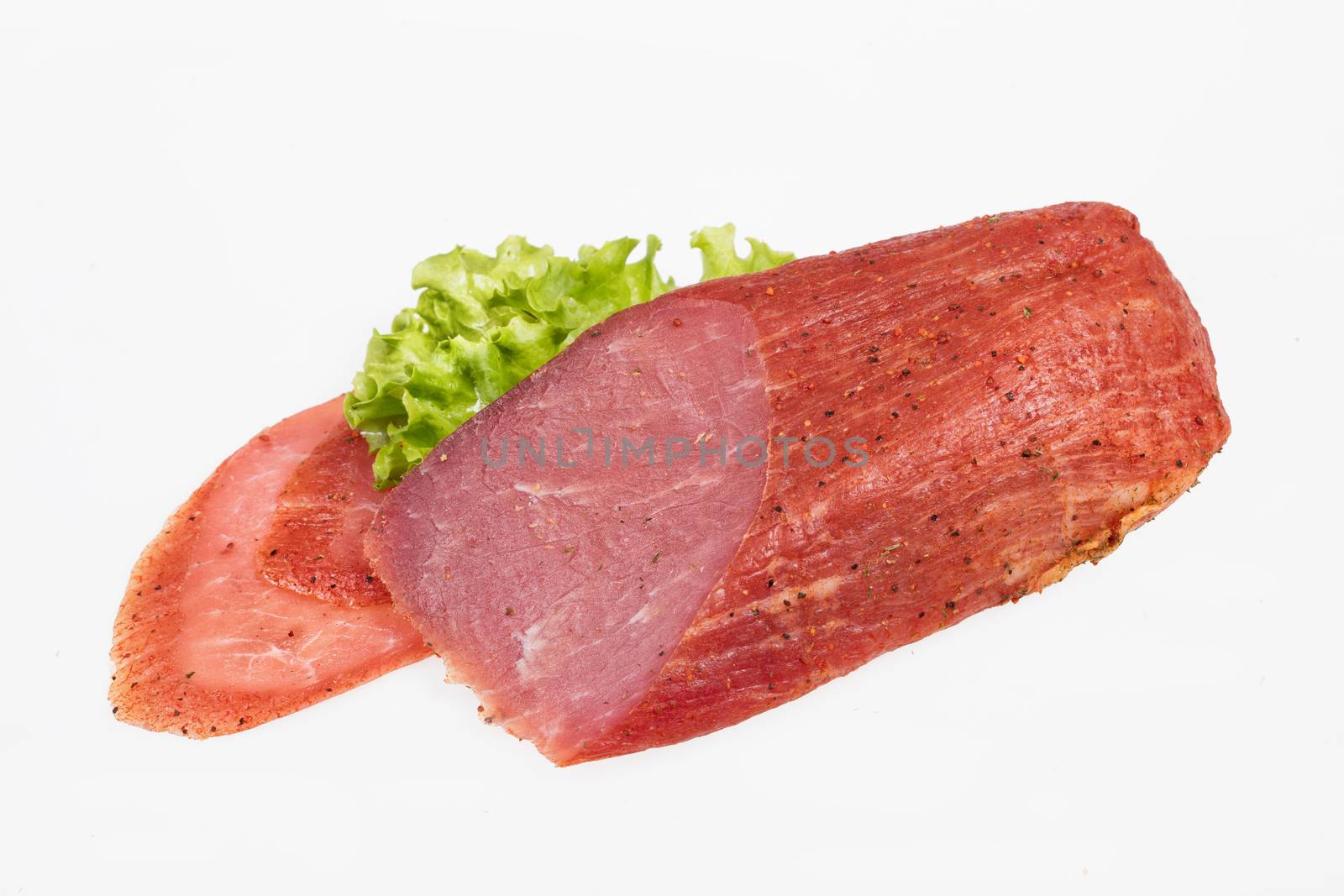 Ham with greenery on an isolated studio background