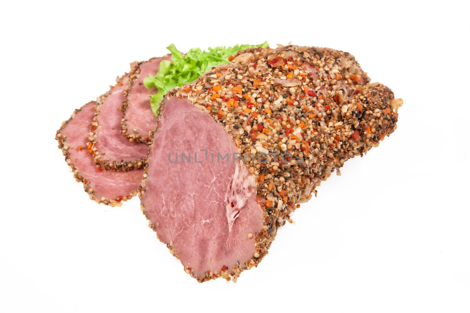 Ham and greenery on an isolated studio background