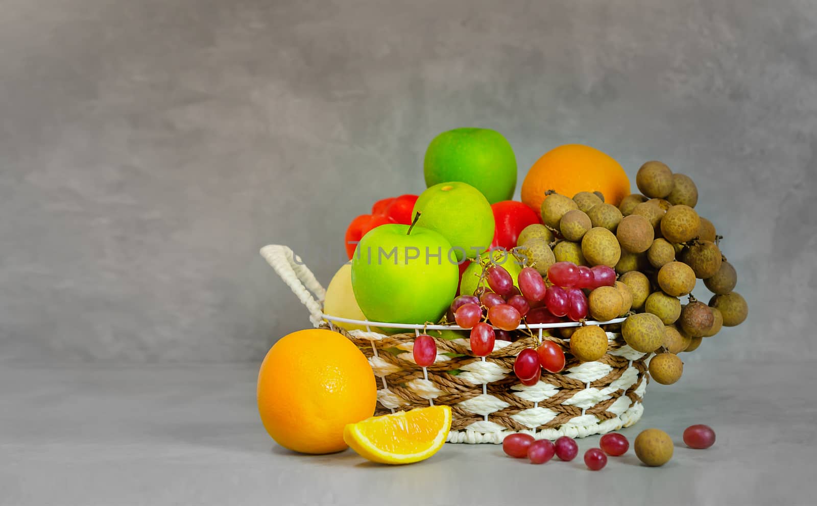 vegetables and fruits in wicker basket  by rakratchada