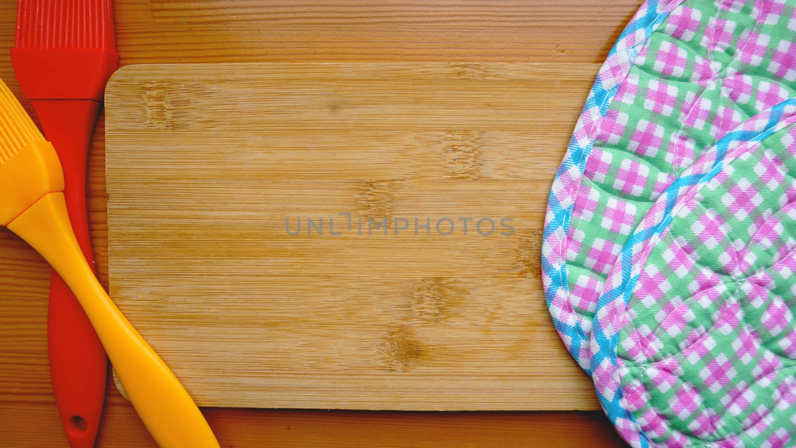 Empty cutting board on planks food background concept by natali_brill