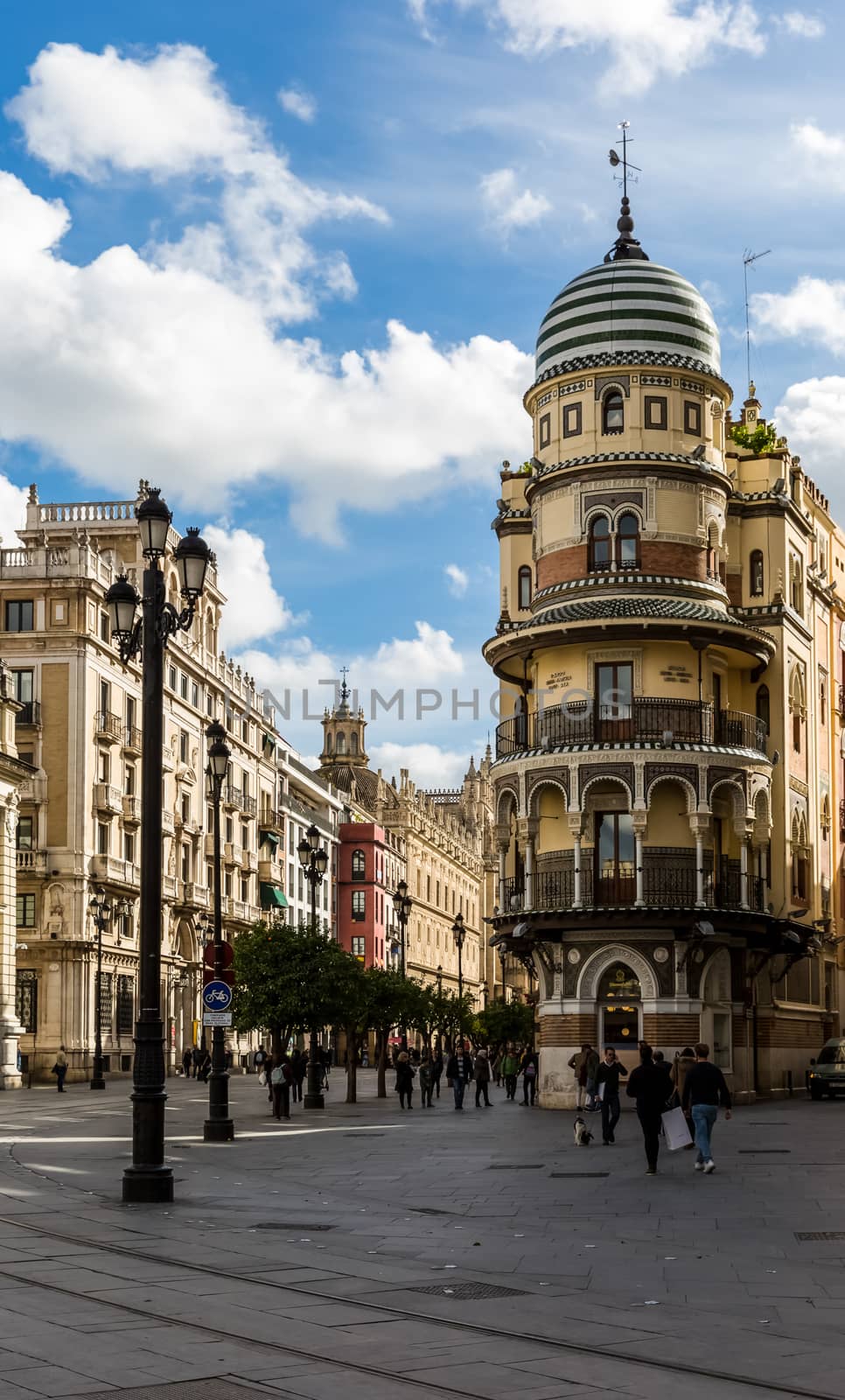 Seville, Spain - July 15, 2017: Seville is the capital of the autonomous community of Andalusia in southern Spain. Streets and sights of the city architecture.