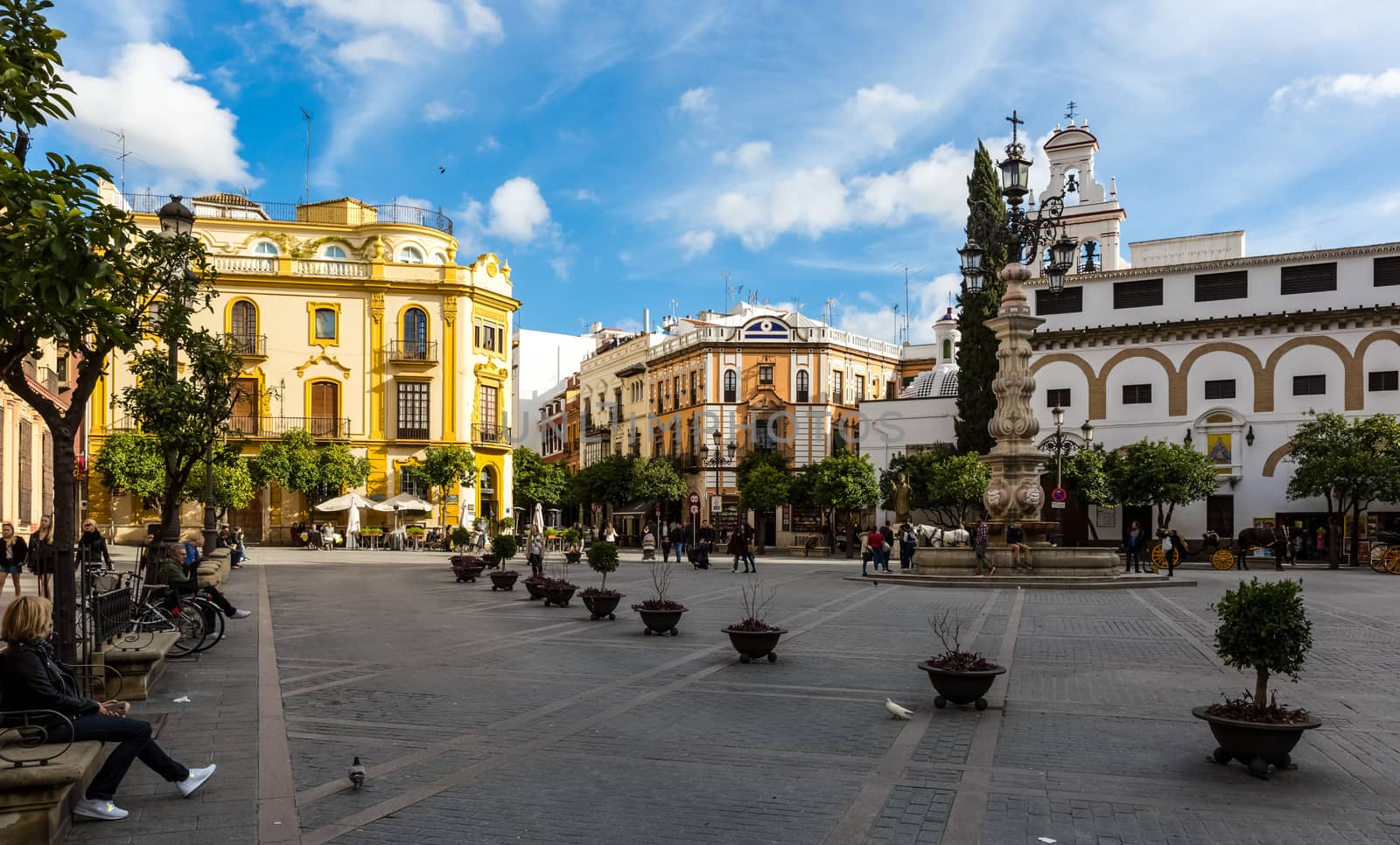 Seville, Spain - July 15, 2017: Seville is the capital of the autonomous community of Andalusia in southern Spain. Streets and sights of the city architecture.