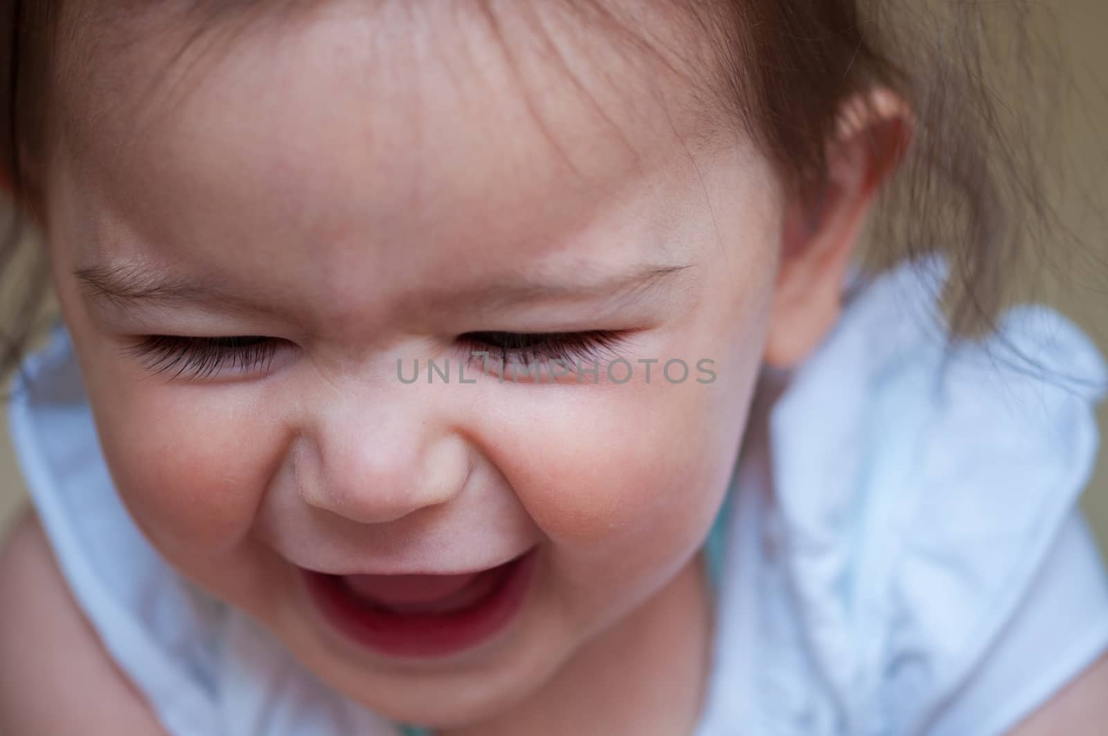 female baby  newborn smile close-up