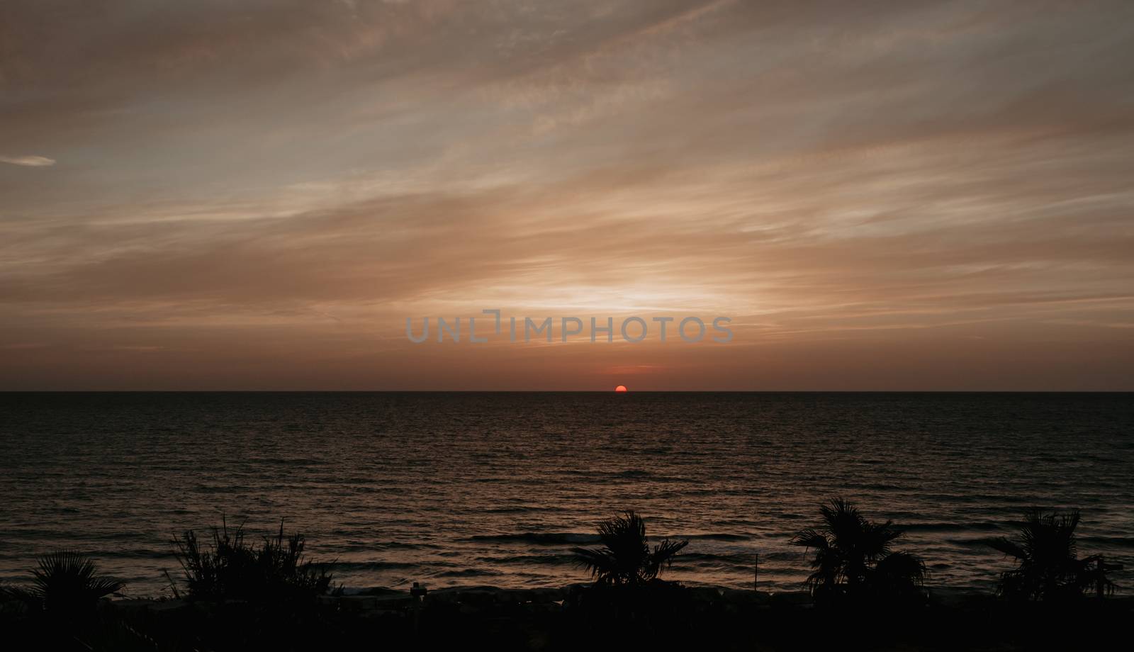 sunset in orange and red from tel aviv israel