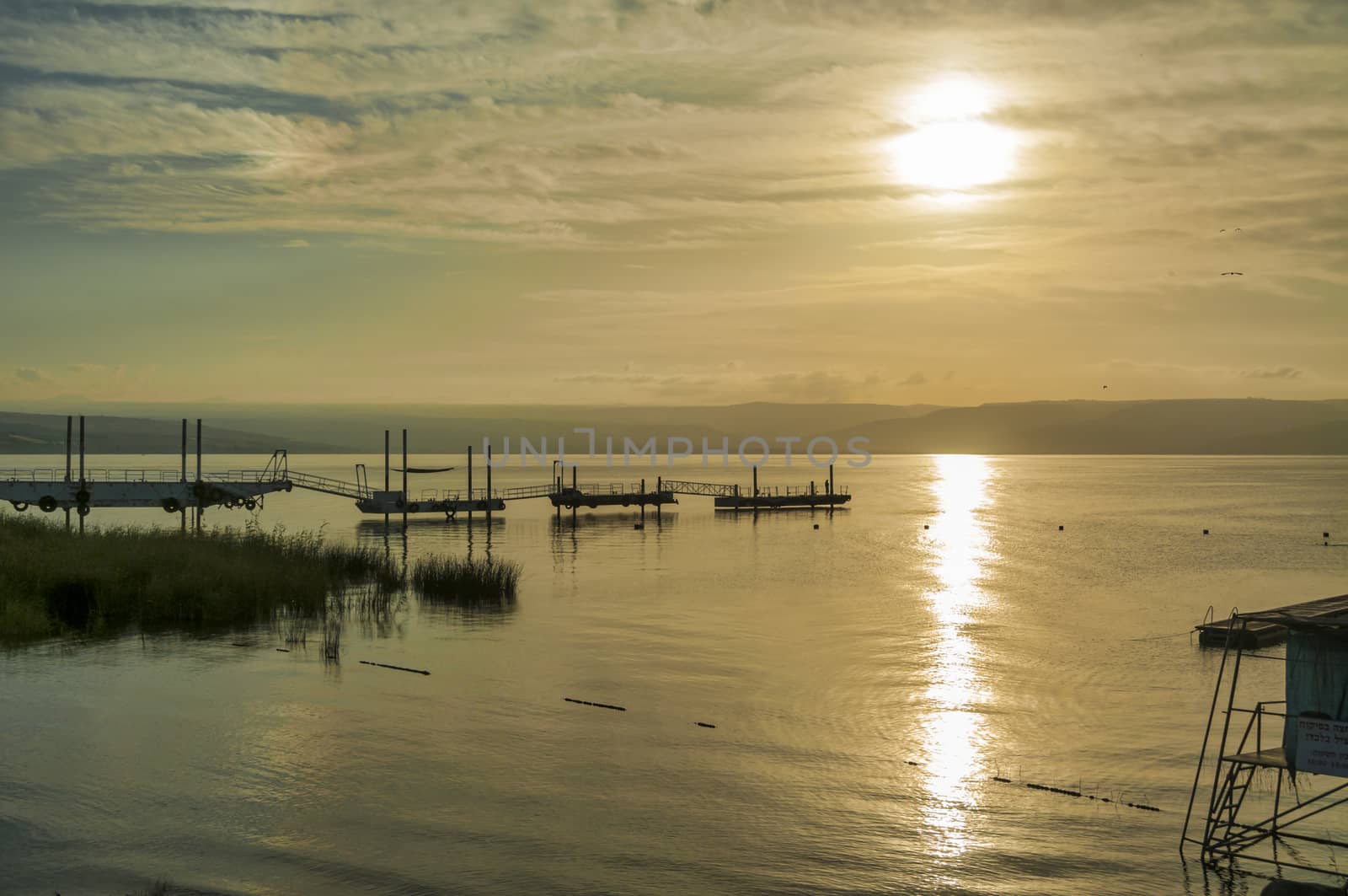 sunset over the lake of galilee or lake tiberias, know from the bibe, where Jesus walked on the water