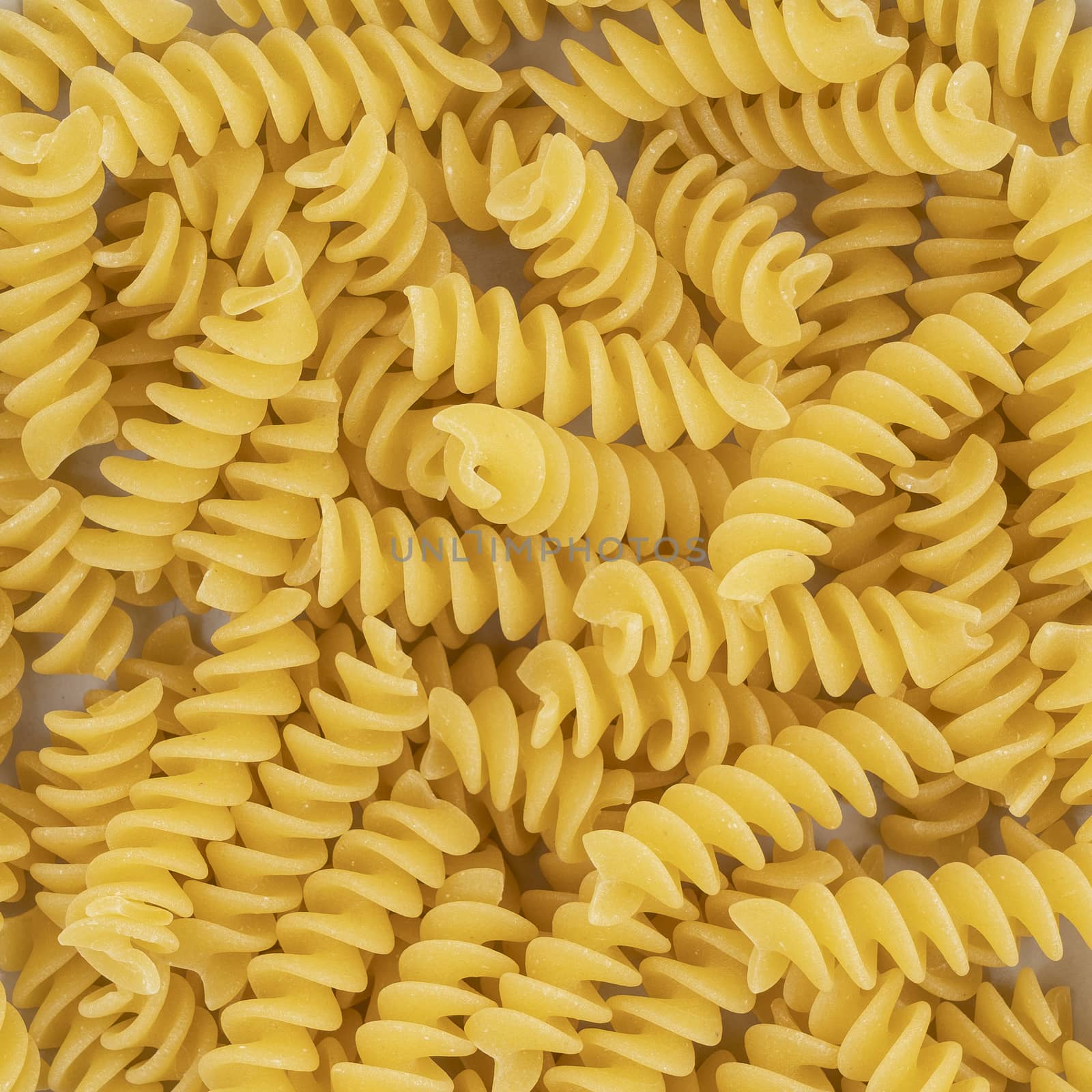 dried Fusilli pasta as a background