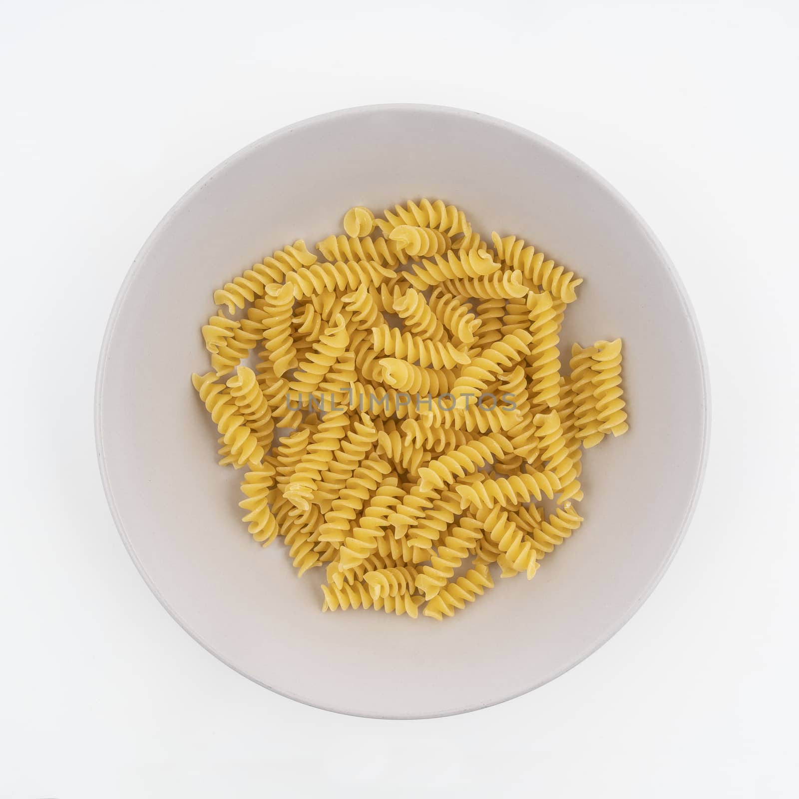 dried Fusilli pasta on a plate