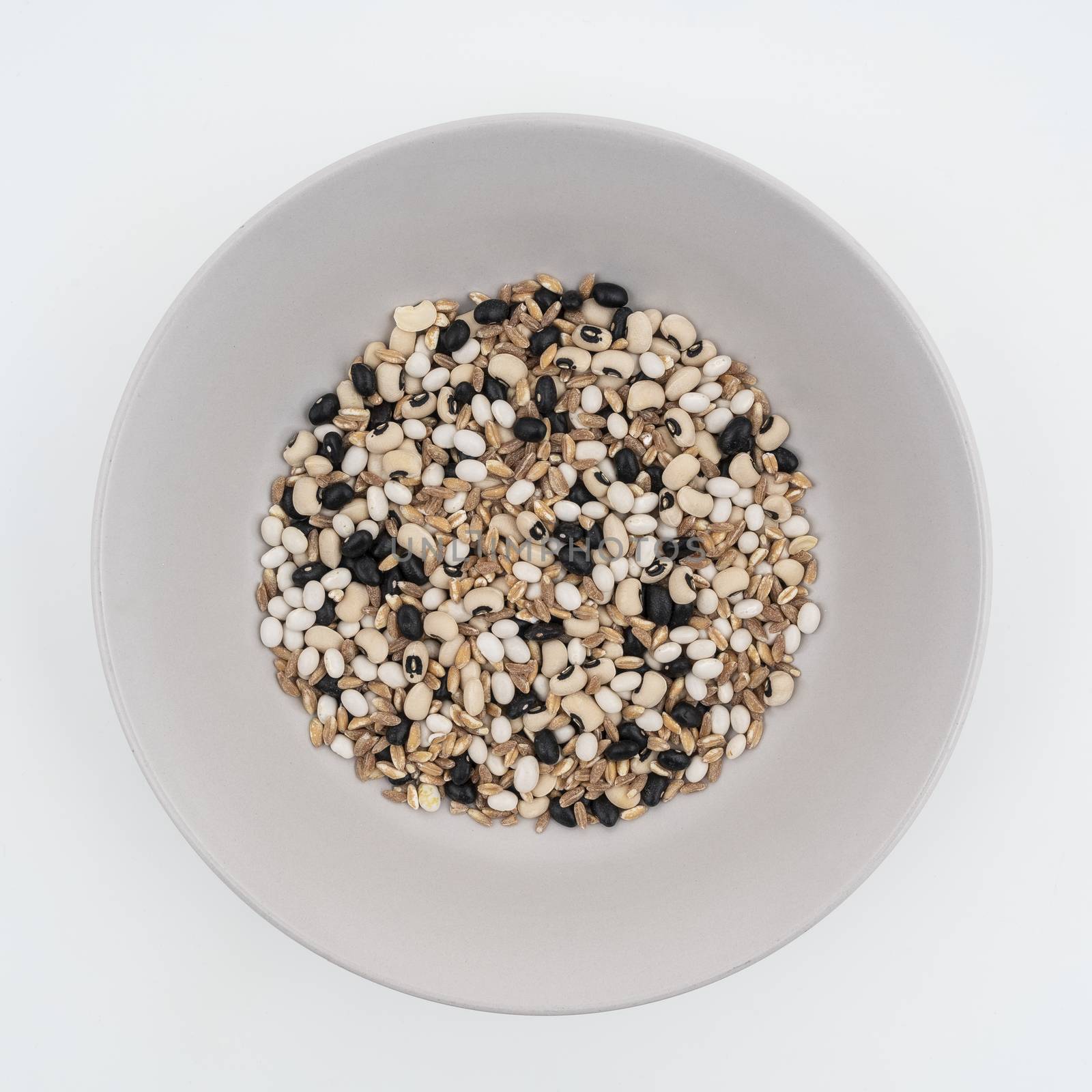 A mixed dried cereals (spelled, barley and beans) on a plate